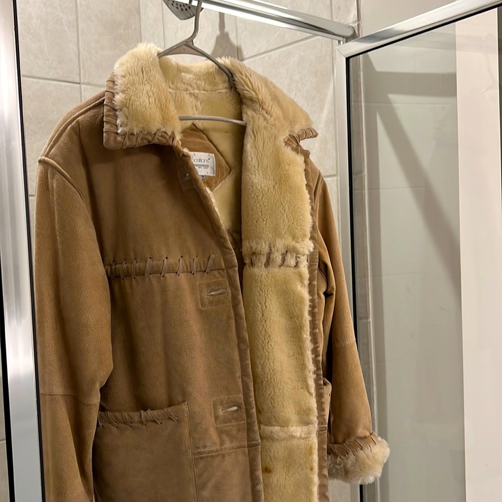 Beautiful camel suede shearing fur coat. Extremely warm for winter.